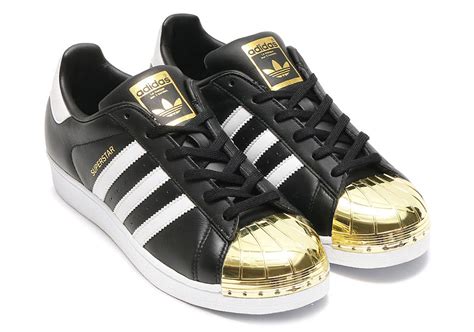 Zwarte, gouden Adidas Superstar online kopen 